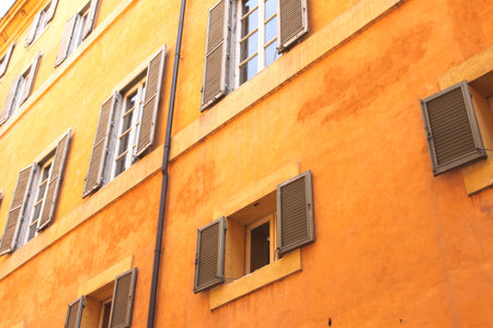 Windows of old house. Mediterranean architecture in Rome, Italy.の写真素材