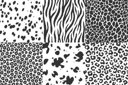 A collection of black and white animal skin seamless patterns. Dalmatian fur, zebra stripes, giraffe, cow, leopard, cheetah or jaguar spots. Safari style textures for fashion, textiles, graphic designのイラスト素材