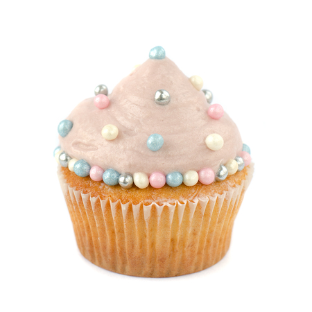 Cupcake decorated with cream and sugar pearlsの写真素材