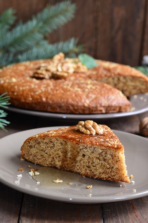 Honey and walnut pie on wooden backgroundの写真素材