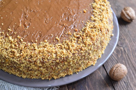 Nut Cake on wooden backgroundの写真素材