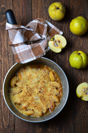 Quince Crumble Pie in a vintage panの写真素材