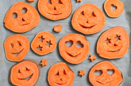 Sweet Potato Carving Funny Faces, Halloween Symbol Creative Food for Kidsの写真素材