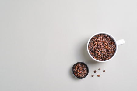 Coffee Beans Mug on Bright Beige Background, Coffee Conceptの写真素材