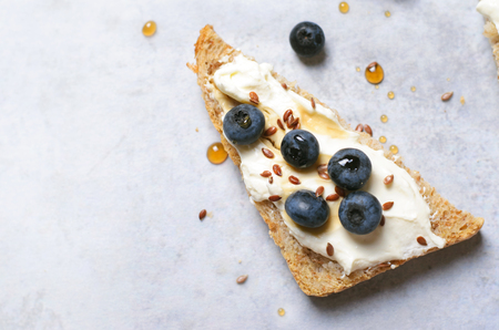 Blueberry Toast, Berries, Cream Cheese Flax Seed and Maple Syrup Dessert, Organic Healthy Mealの写真素材