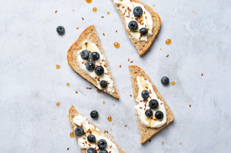 Blueberry Toast, Berries, Cream Cheese Flax Seed and Maple Syrup Dessert, Organic Healthy Mealの写真素材