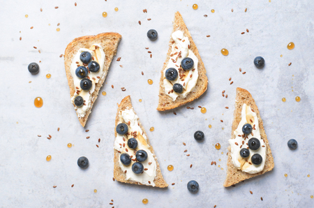 Blueberry Toast, Berries, Cream Cheese Flax Seed and Maple Syrup Dessert, Organic Healthy Mealの写真素材