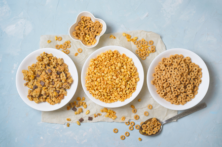 Different Kinds of Cereals, Quick Breakfast, Healthy Snacks, Puffed Rice, Cereal Loops and Chocolate Granolaの写真素材