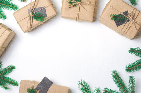 Christmas Gifts with Fir Branches on White Background, Winter Holidays Concept