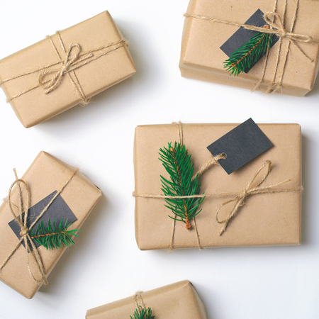 Christmas Gifts with Fir Branches on White Background, Winter Holidays Conceptの写真素材