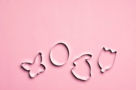 Easter Concept, Cookie Cutters on Pink Background, Copy Spaceの写真素材