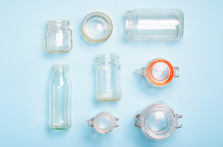 Variety of Glass Jars and Bottles, Zero Waste Shopping Concept, Storage Jars over Light Blue Backgroundの写真素材