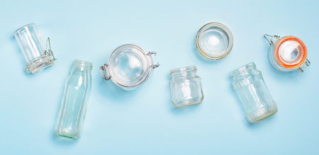 Variety of Glass Jars and Bottles, Zero Waste Shopping Concept, Storage Jars over Light Blue Backgroundの写真素材