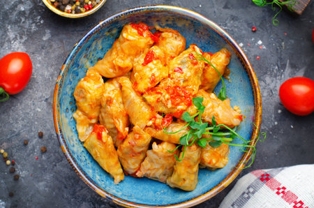 Homemade Cabbage rolls with meat, rice and vegetables. Stuffed cabbage leaves also known as sarma,...