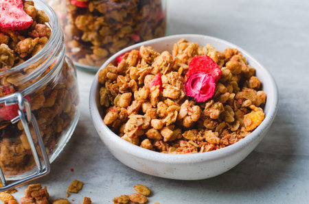 Granola with Dried Berries on Bright Background, Healthy Breakfast