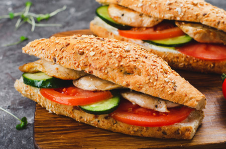 Grilled Chicken and Vegetable Sandwich, Healthy and delicious snack, breakfast, dinner or lunch on Dark Backgroundの写真素材