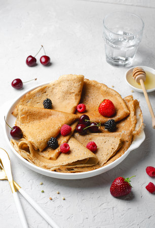 Crepes with Mixed Berry Topping, Tasty Homemade Breakfast with Fresh Berriesの写真素材