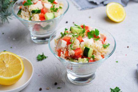 Rice Surimi Vegetable Salad, Tasty Appetizer on Bright Backgroundの写真素材