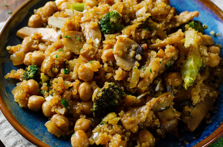 Quinoa with Chickpea, Mushrooms, and Broccoli, Healthy Meal, Vegetarian Food, Dark Rustic Backgroundの写真素材