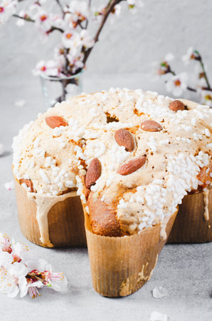 Colomba, Italian Easter Dove Cake on Bright Background, Springtime Traditional Breadの写真素材