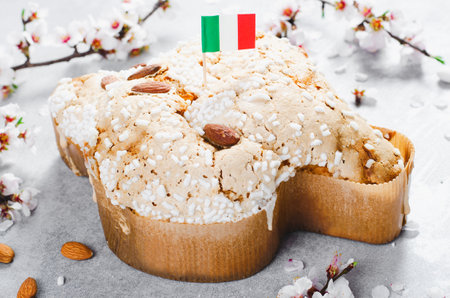 Colomba, Italian Easter Dove Cake on Bright Background, Springtime Traditional Breadの写真素材