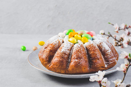 Easter Cake, Traditional Cake Decorated with Sugar Eggs on Bright Grey Background