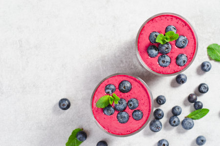 Blueberry Smoothie, Tasty Refreshing Drink, Healthy Food, Vegan or Vegetarian Diet Food Concept, Bright Backgroundの写真素材
