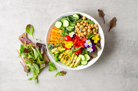 Vegan Buddha Bowl with Chickpeas, Avocado and Fresh Vegetables, Healthy Eating, Tasty Vegetarian Mealの写真素材
