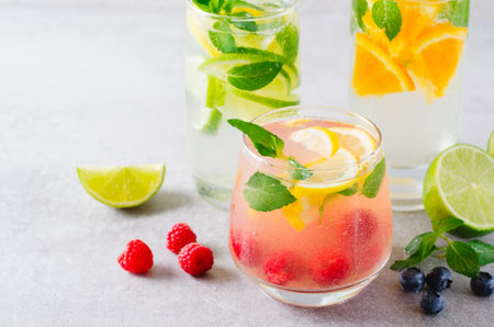 Summer Drinks Set, Fruit, Citrus and Berry Refreshing Lemonades or Cocktails on Bright Backgroundの写真素材