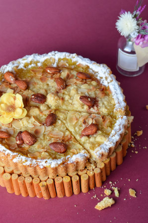 Lemon Tart Decorated with Almonds, Freshly Baked Pie with Lemon Filling