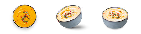 Sweet Potato Soup, Fresh Homemade Pumpkin, Sweet Potato, Carrot Soup in a Bowl on White Backgroundの写真素材