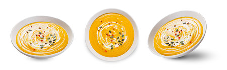 Sweet Potato Soup, Fresh Homemade Pumpkin, Sweet Potato, Carrot Soup in a Bowl on White Isolated Backgroundの写真素材