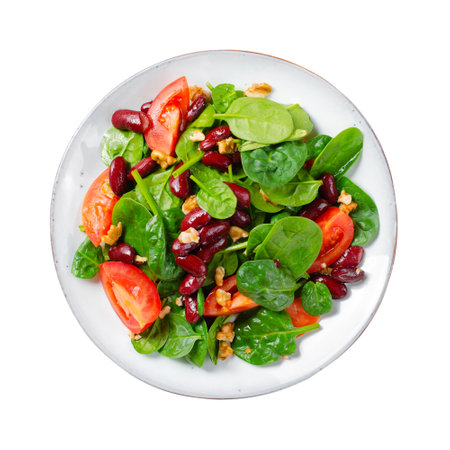 Red Bean Salad On White Background Isolated, Fresh Salad with Spinach, Cherry Tomatoes, Walnuts, Beans and Mustard Dressingの写真素材