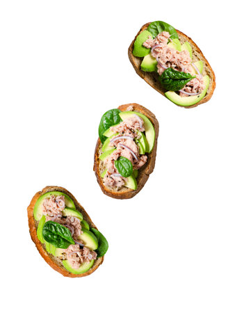 Tuna Avocado Toasts, Healthy Snack or Breakfast on White Background Isolatedの写真素材
