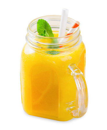 Orange Smoothie in a Jar, Vitamin Drink or Refreshing Cocktail on White Isolated Backgroundの写真素材