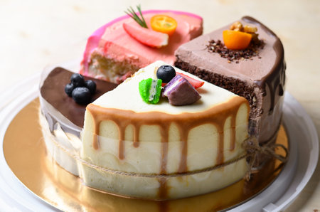 Assorted Different Pieces of Cake in One Dessert, Cake Made of Four Tasty Flavorsの写真素材
