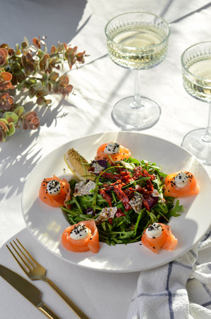 Salad with Salmon, Arugula and Sun-Dried Tomatoes, Fresh Saladの写真素材