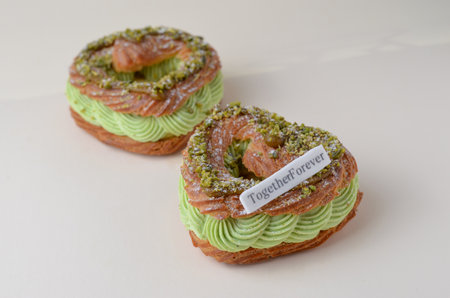 Pistachio Eclair, Heart Shaped Romantic Dessert, Valentine's Day Sweet Treatの写真素材