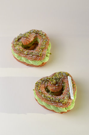 Pistachio Eclair, Heart Shaped Romantic Dessert, Valentine's Day Sweet Treatの写真素材