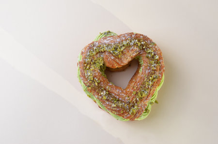Pistachio Eclair, Heart Shaped Romantic Dessert, Valentine's Day Sweet Treatの写真素材