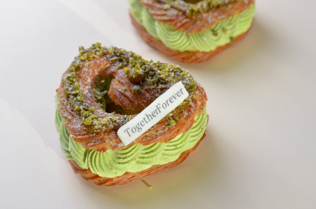 Pistachio Eclair, Heart Shaped Romantic Dessert, Valentine's Day Sweet Treatの写真素材