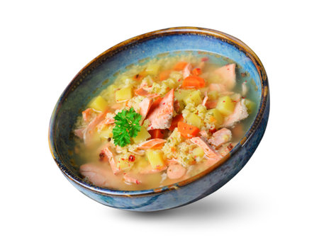 Fish Soup with Salmon, Millet and Vegetables, Tasty Meal on White Isolated Backgroundの写真素材