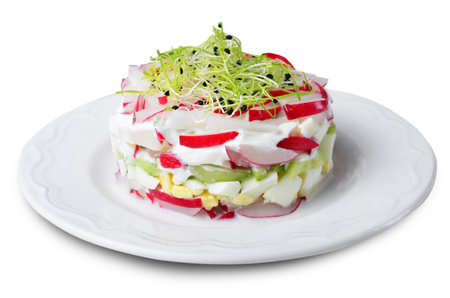 Radish Salad with Cucumber, Eggs and Sour Cream on White Isolated Backgroundの写真素材