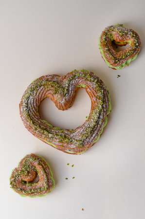 Pistachio Eclair Cake, Heart Shaped Romantic Dessert, Valentine's Day Sweet Treatsの写真素材