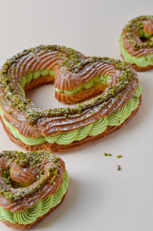 Pistachio Eclair Cake, Heart Shaped Romantic Dessert, Valentine's Day Sweet Treatsの写真素材