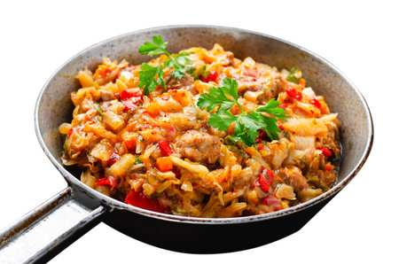 Stewed Cabbage with Meat and Vegetables, Comfort Food, Braised Cabbage, Tasty Meal on White Isolated Backgroundの写真素材