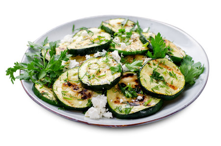 Grilled Zucchini, Feta and Herbs Warm Appetizer on White Isolated Backgroundの写真素材