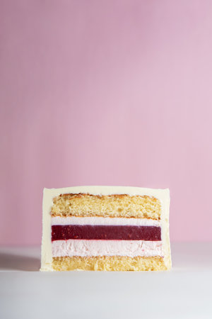 Layered Cake Cut, Delicious Cake with Cream Cheese Frosting and Berry Fillingの写真素材