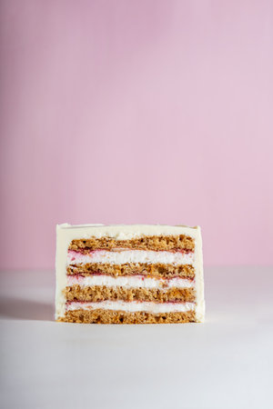 Layered Cake Cut, Delicious Cake with Cream Cheese Frosting and Berry Fillingの写真素材