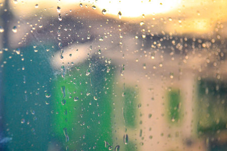 water drops on the misted glass in the defocus. sweat on the window, moisture after the rain....